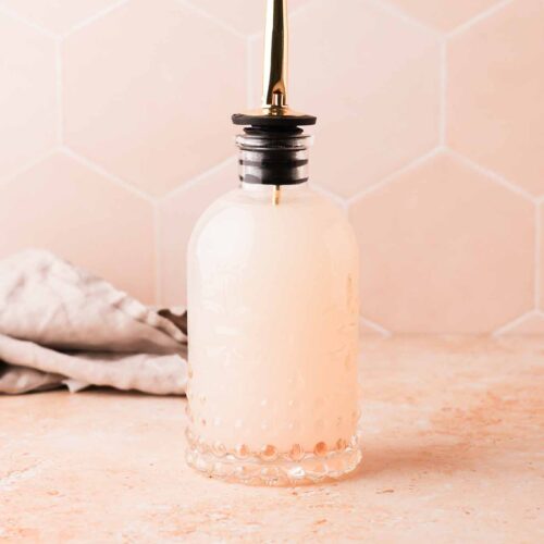 lychee syrup in a glass bottle