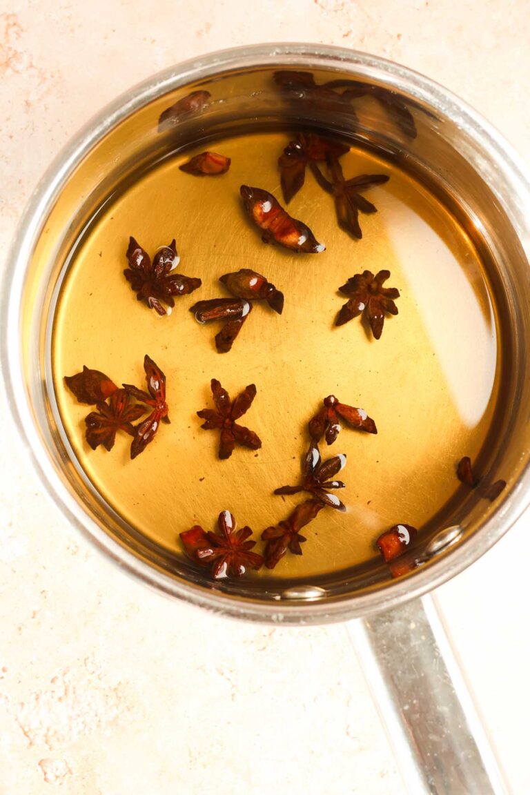 star anise simple syrup cooling in a saucepan