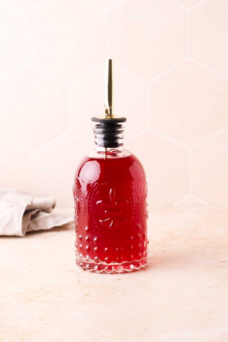 a glass of blackberry simple syrup
