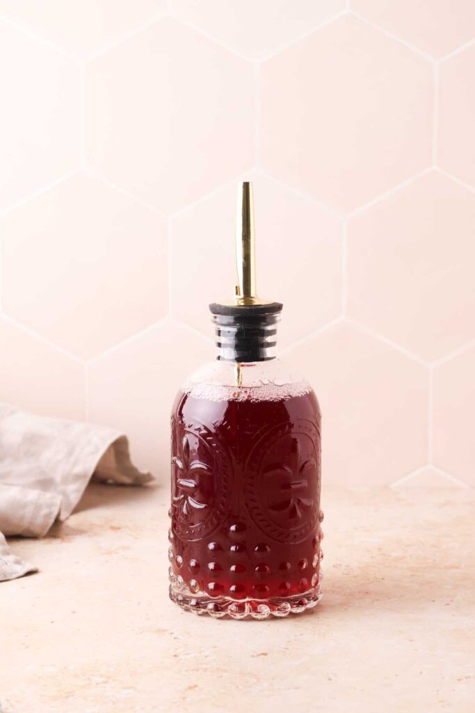 cherry simple syrup in a bottle