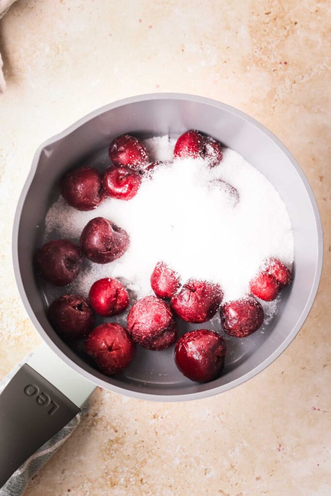 cherries and sugar in a saucepan