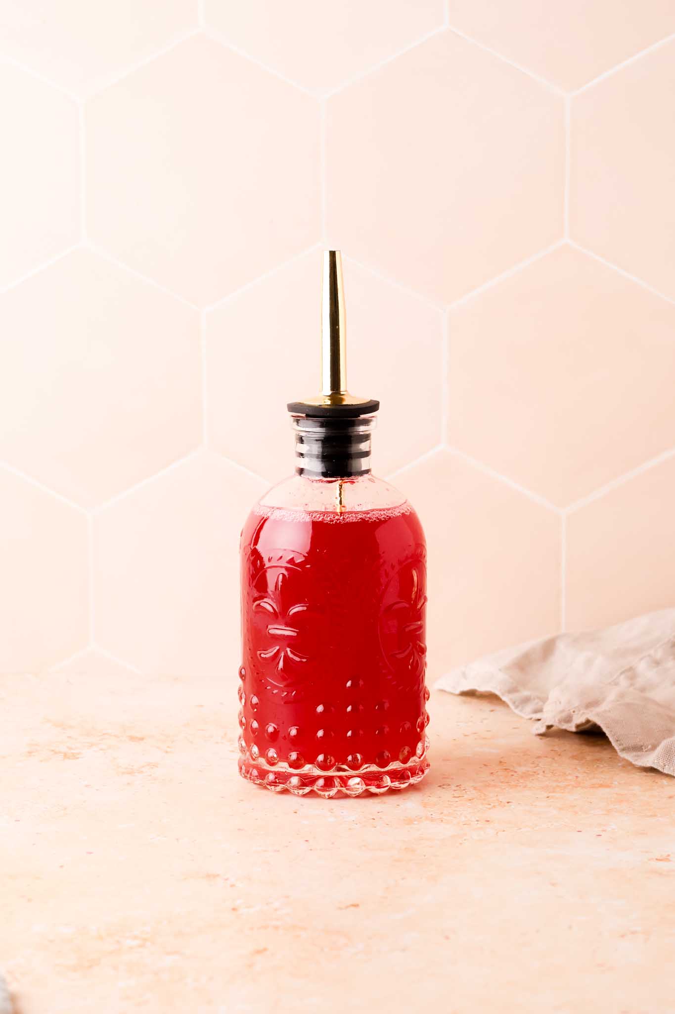 raspberry simple syrup in a bottle