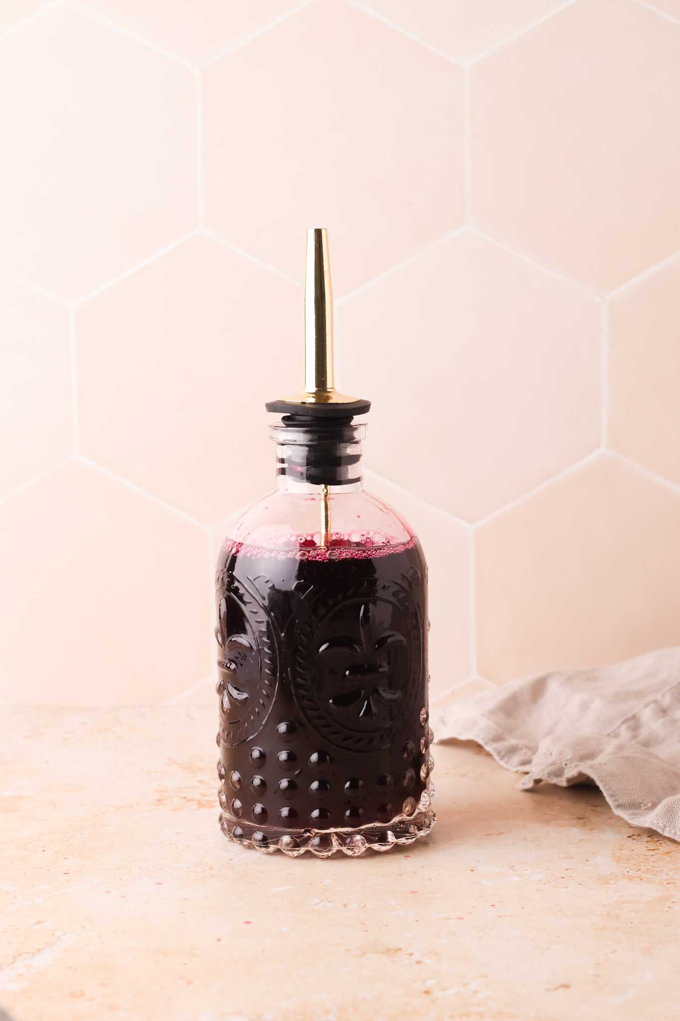 blueberry simple syrup in a bottle