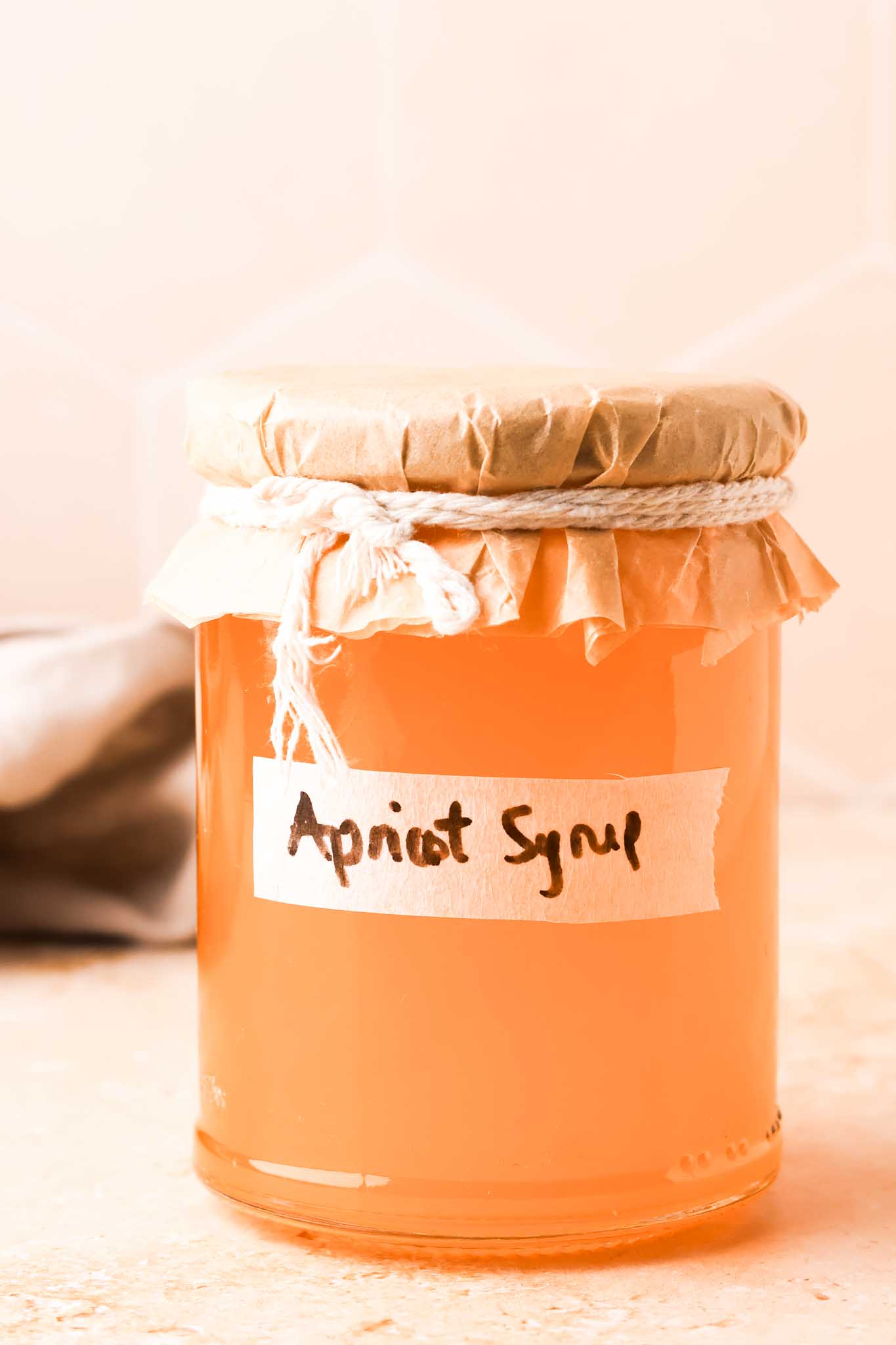 apricot simple syrup in jar