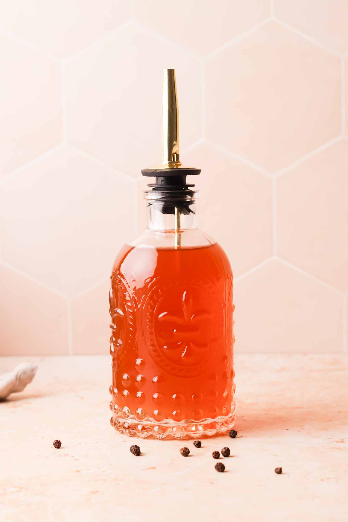 black pepper syrup in a bottle