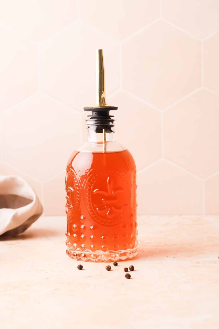 black pepper simple syrup in a jar
