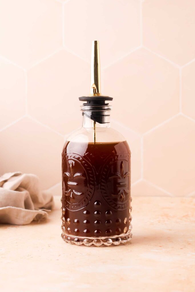 dark brown syrup in a bottle