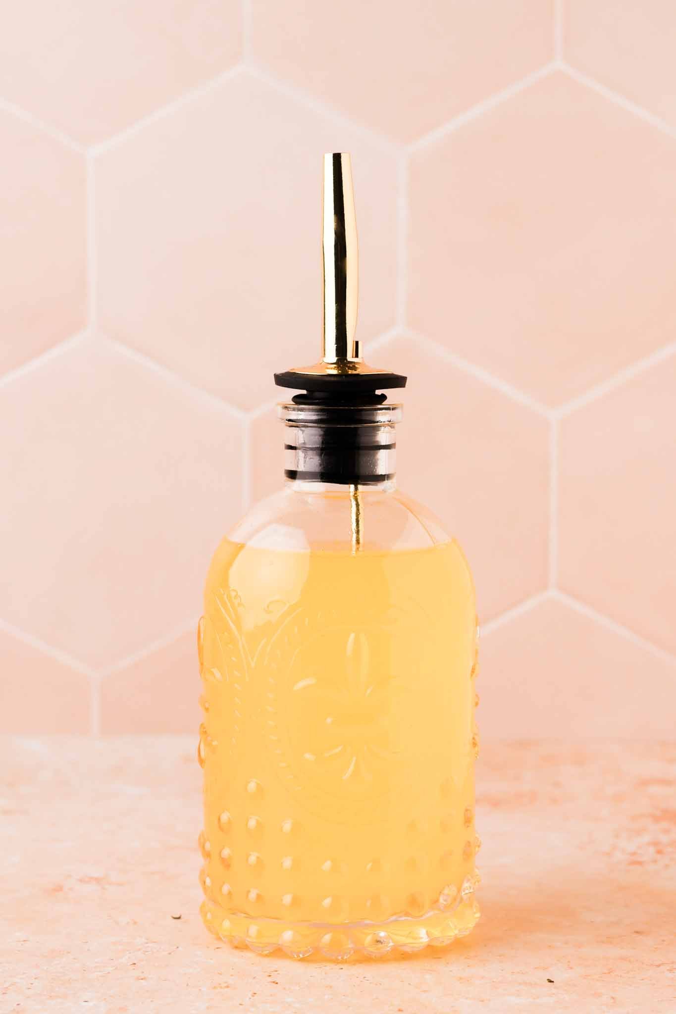 orange blossom simple syrup in a jar